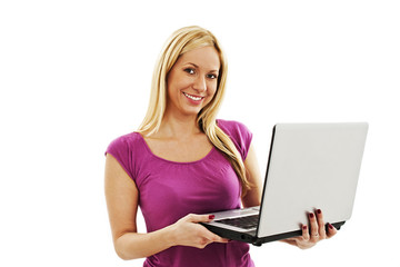 Portrait of a pretty young woman holding a laptop