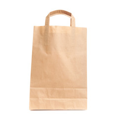 Modern shopping paper bag isolated on white