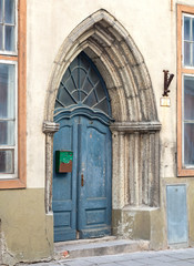 Blue Gothic wooden door in old town of Tallinn