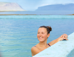 smiling woman in bathing suit...