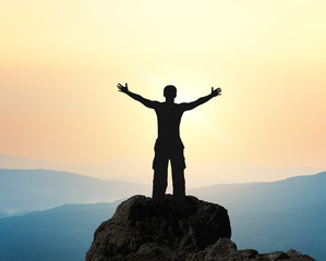 Fototapeta premium Man on top of mountain.
