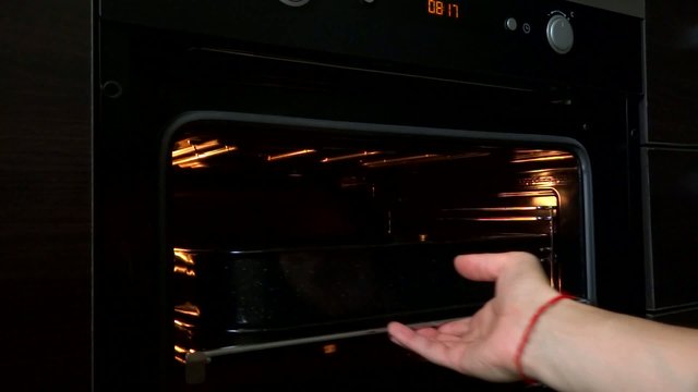 person open oven cooking