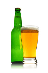 Beer bottle and glass full of light beer