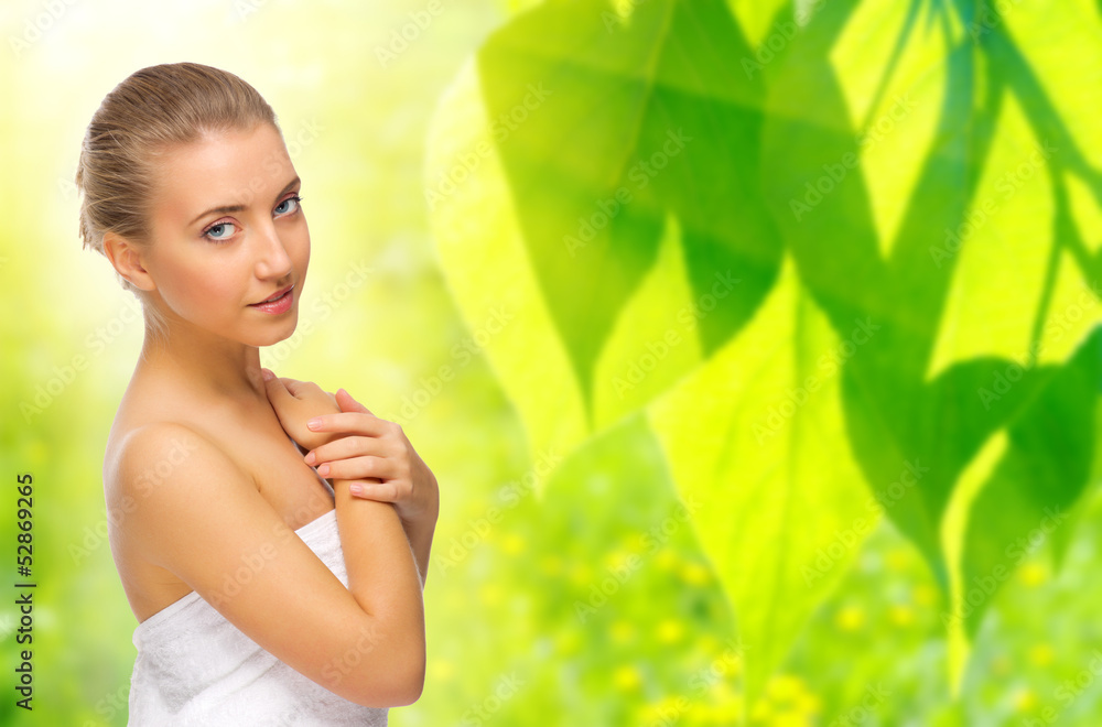 Wall mural young healthy girl on floral background