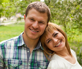 Fototapeta premium Young couple relaxing in park