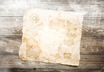 old treasure map  on wooden background