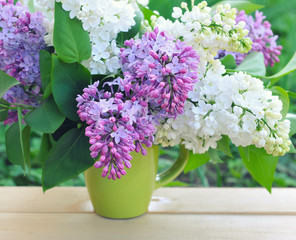 Bouquet of lilac on a natural background