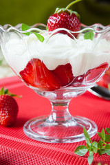 delicious strawberry dessert in a transparent sundae dish