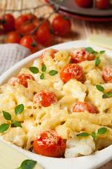 penne pasta with cheese and tomato