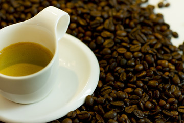 Cup of coffee and coffee beans
