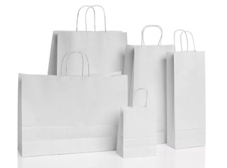 Various white paper shopping bags isolated - 52878265