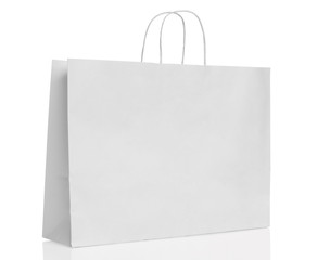 White paper shopping bag isolated. - obrazy, fototapety, plakaty