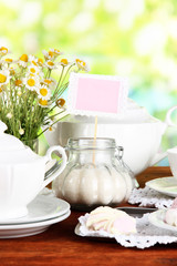 Table setting with chamomiles