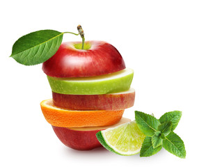 Apples and orange fruit with lime and green mint leaves isolated