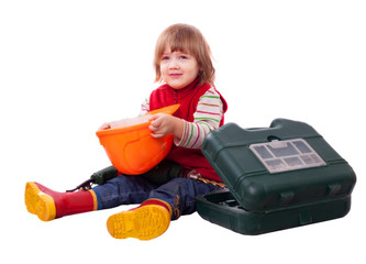 Happy child with builder hardhat and tools