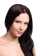 Fototapeta premium Beautiful brunette twenty years' girl. Isolated on white.