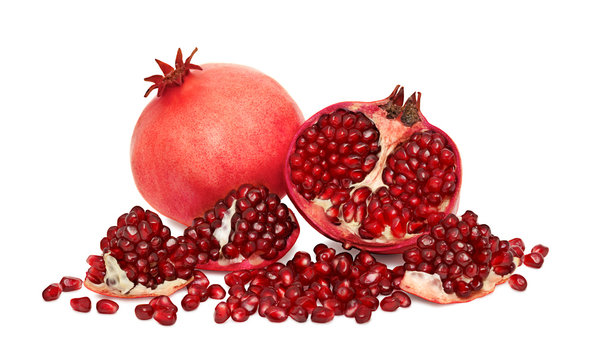 Ripe pomegranates with seeds isolated