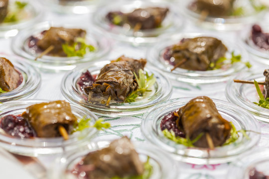 dolmades / stuffed vineleaves with deer and red chutney
