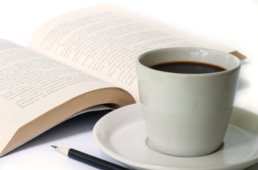 cup of coffee and  the book.