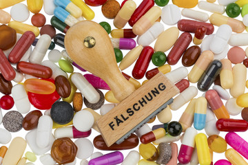 Stempel auf bunten Tabletten