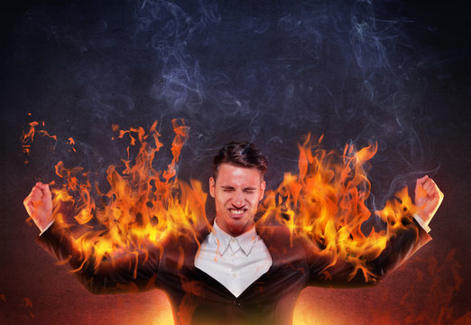 Businessman burning with anger