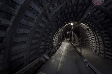 Coal mine machinery: belt conveyor in underground tunnel