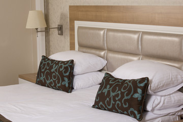 Obraz premium King sized bed in a luxury hotel room