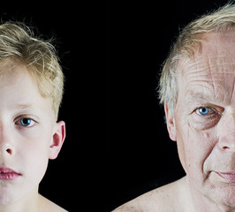 Old man and young boy face comparison closeup