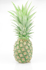 Green pineapple on white background