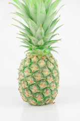 Closed up green pineapple on white background