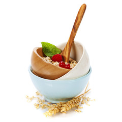 healthy breakfast with bowl of oat flakes