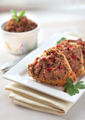 Liver pate with paprika on slices of wholegrain bread