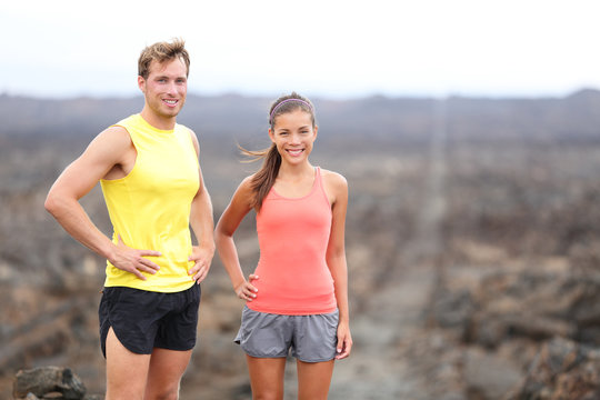 Portrait of runner couple resting after running