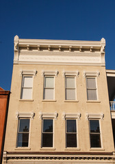Obraz premium Brown Stone Building with Window Trim