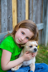 Blond happy girl with her chihuahua doggy portrait