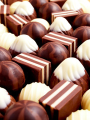 Obraz na płótnie Canvas Chocolate candy as a background. Tasty food