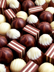 Chocolate candy as a background. Tasty food