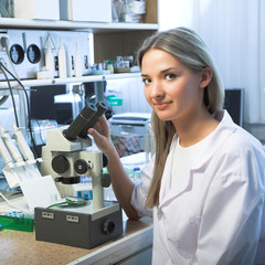 researcher with microscope