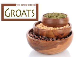 Different kinds of beans in bowls isolated on white