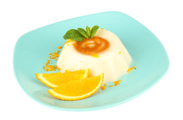 Panna Cotta with orange zest and caramel sauce, isolated