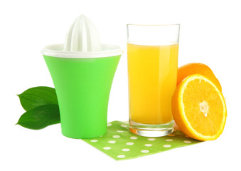 Citrus press, glass of juice and ripe oranges, isolated on