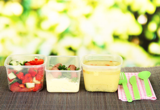 Tasty lunch in plastic containers,