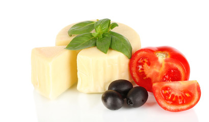 Cheese mozzarella,basil and vegetables isolated on white