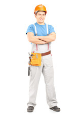 Full length portrait of a confident repairman in a uniform