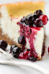Cheesecake slice with mixed berries topping