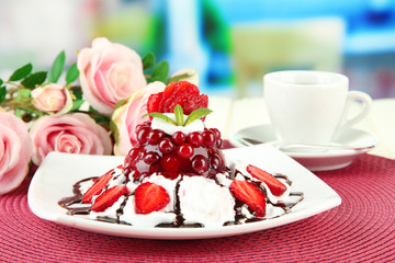 Tasty jelly dessert with fresh berries, on bright background