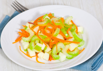 salad with celery, carrots and apples