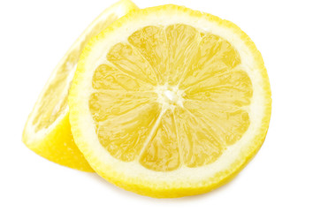 Half lemon close up on the white