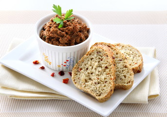 Liver pate with paprika with slices of wholegrain bread