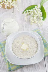 Obraz na płótnie Canvas Oatmeal porridge with butter